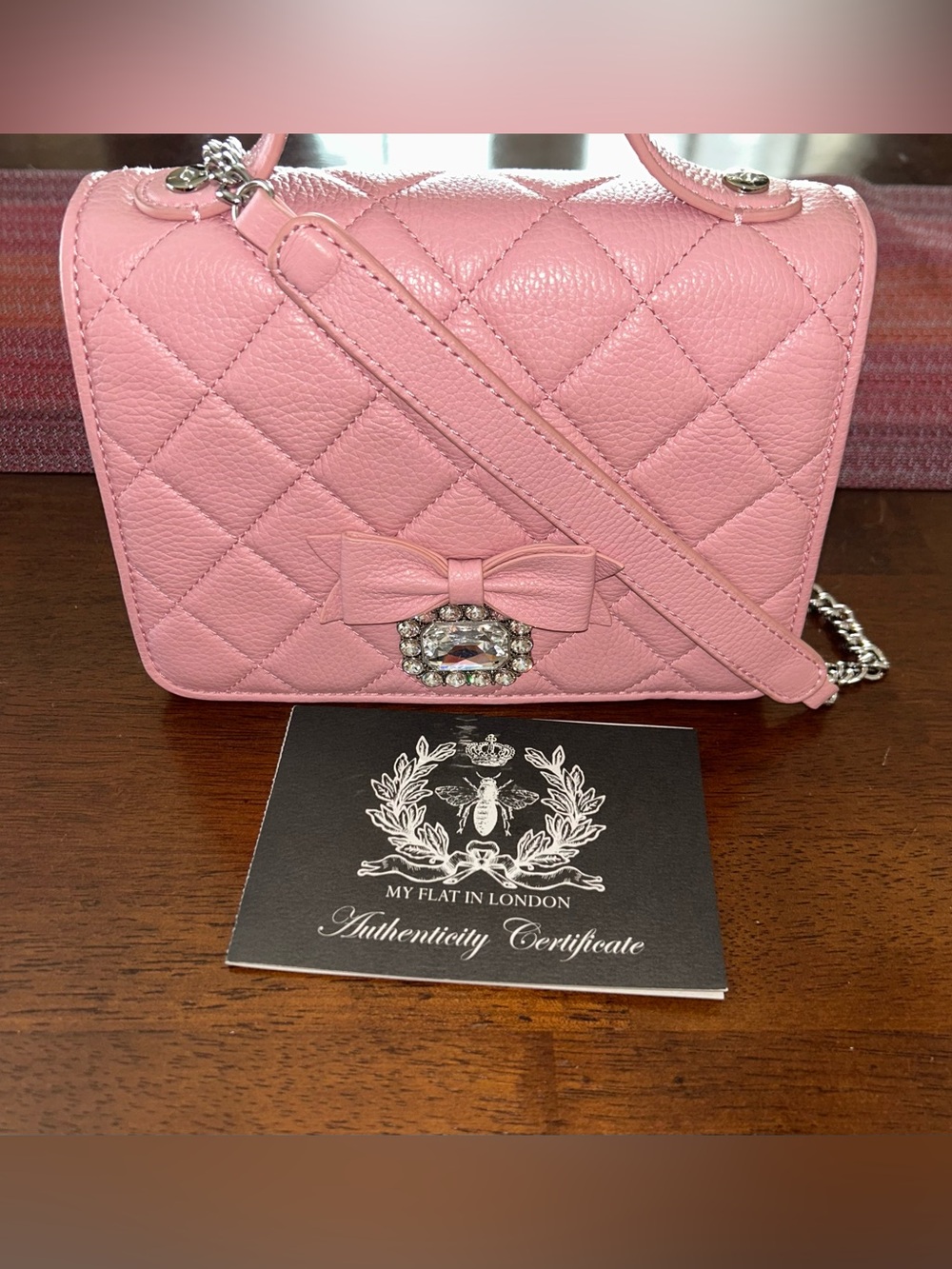 Retired My Flat in London Quilted Bow Crossbody